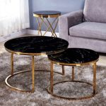 Table Ushuaia marbre noir pieds or